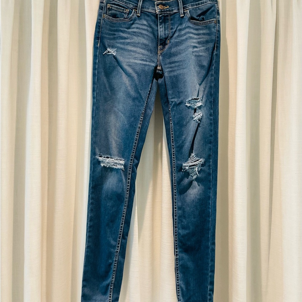 Distressed Blue Jeans